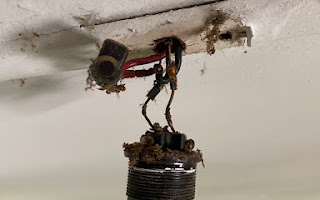Old electrical cable with disintegrating insulation found in a Perth roof space