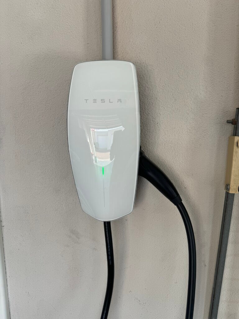 Tesla Wall Connector installed in a Perth garage by Web X Electricians Perth